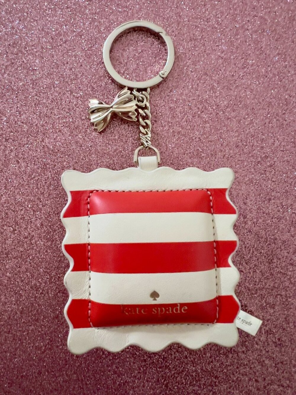 Kate Spade New York "Mangia Ravioli" coin purse is crafted from smooth leather